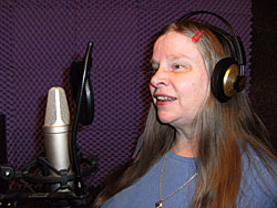 Picture of Annabel singing in the studio