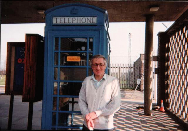 Picture of Deryck by a blue phone box